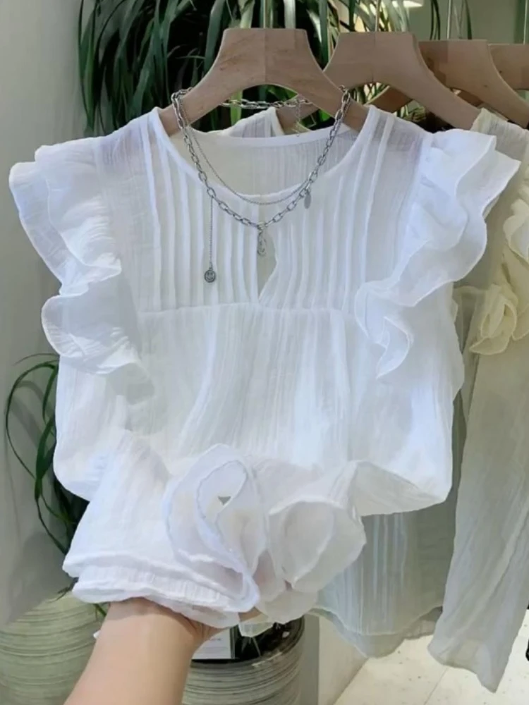 White Blouses for Women 2025 Blusas Mujer De Moda Sleeveless O-neck Loose Shirts Ruffles Loose Vintage Summer Blouse Tops Female White Blouses for Women 2025 Blusas Mujer De Moda Sleeveless O-neck Loose Shirts Ruffles Loose Vintage Summer Blouse Tops Female